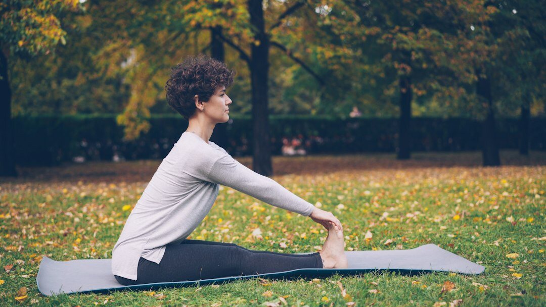 woman doing yoga outdoors