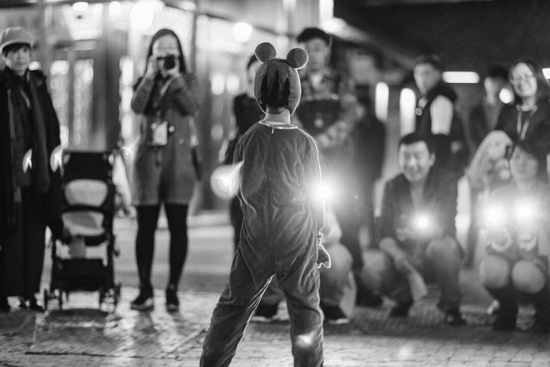 Photographer taking pictures of celebrities at a red carpet premiere